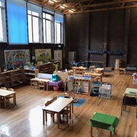The Hall -  looking West towards the South windows, with Montessori preschool table and chairs